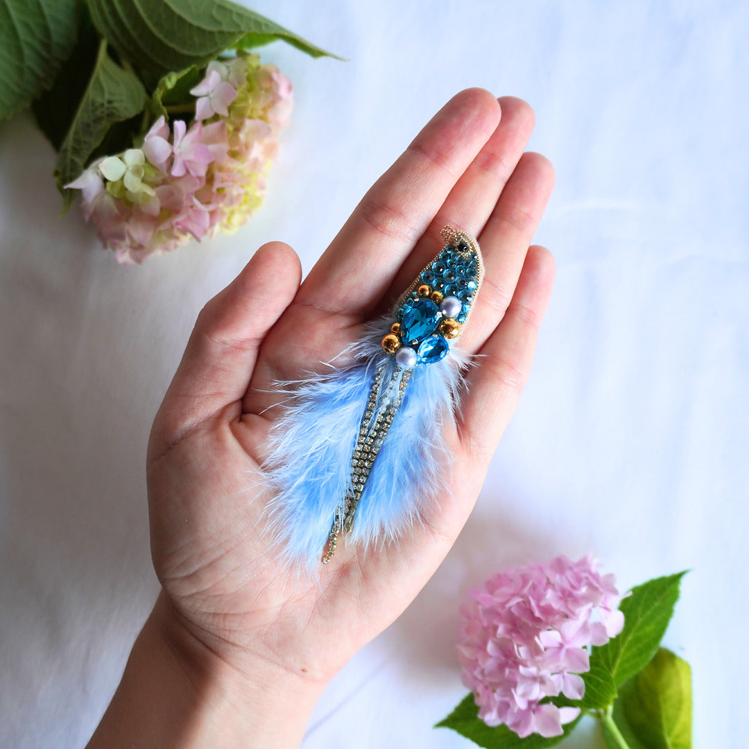 Azure blue and gold beaded bird TGbrooch with beads, gemstones and feathers