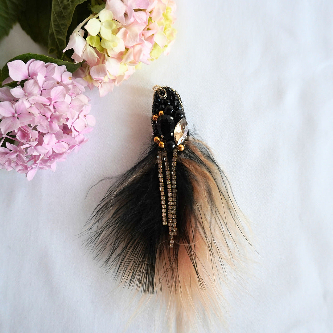 Handmade beaded bird brooch with black and gold gemstones, beads and feathers - TGbrooch
