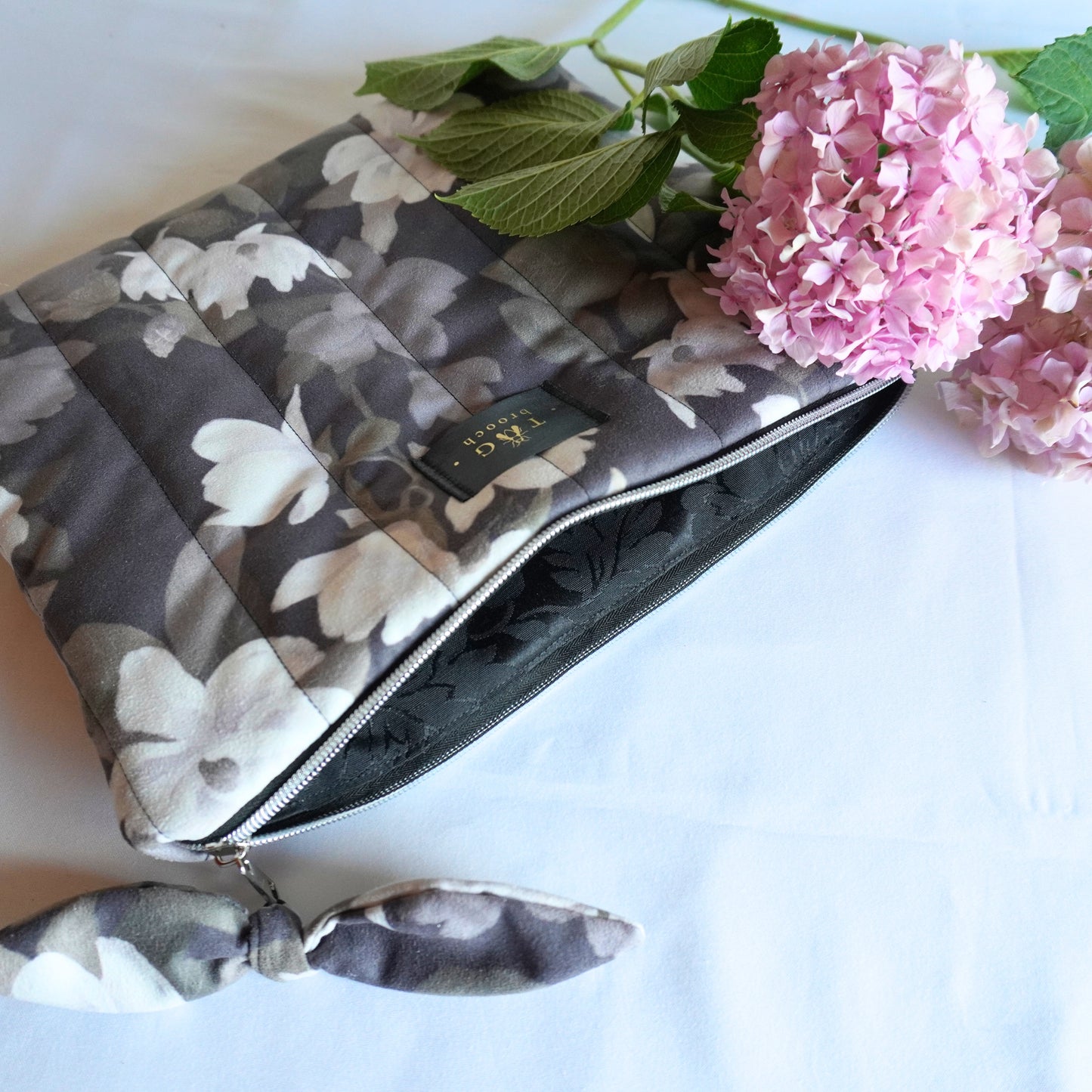 Handmade iPad bag with magnolia flower pattern and opened zipper - TGbrooch