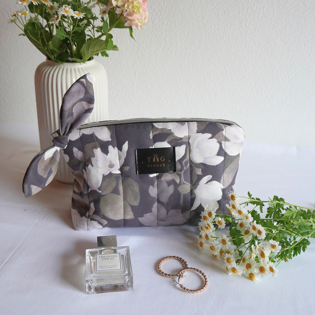 Handmade medium size toiletry bag with magnolia bloom floral pattern designed by TGbrooch and printed on velvet