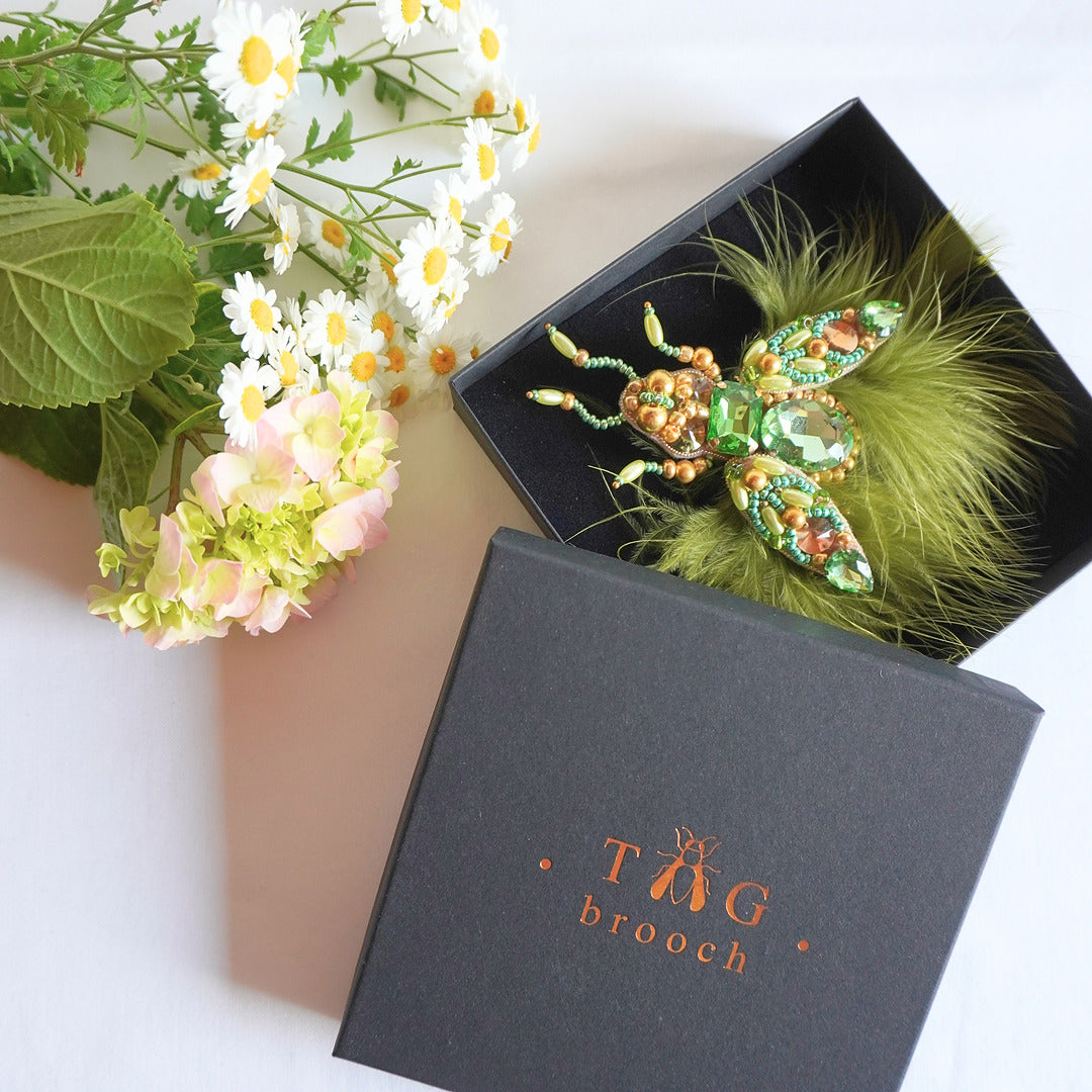 Handmade beaded olive green and gold insect brooch in a black box - TGbrooch