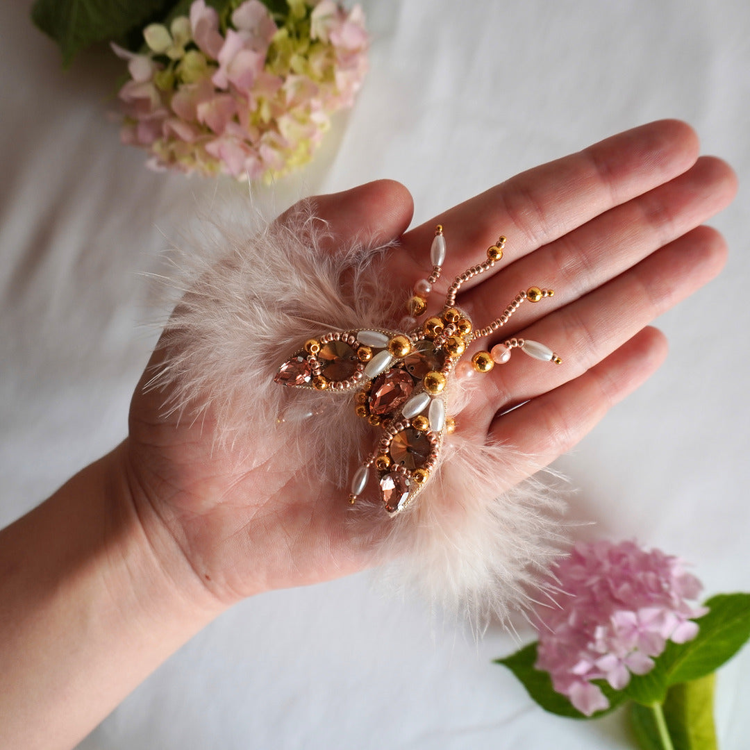 Handmade small size beaded TGbrooch in peach and gold color combination