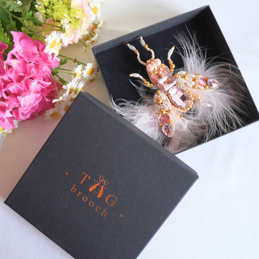 Decorative beaded TGbrooch in pink and gold feathers,beads and gemstones