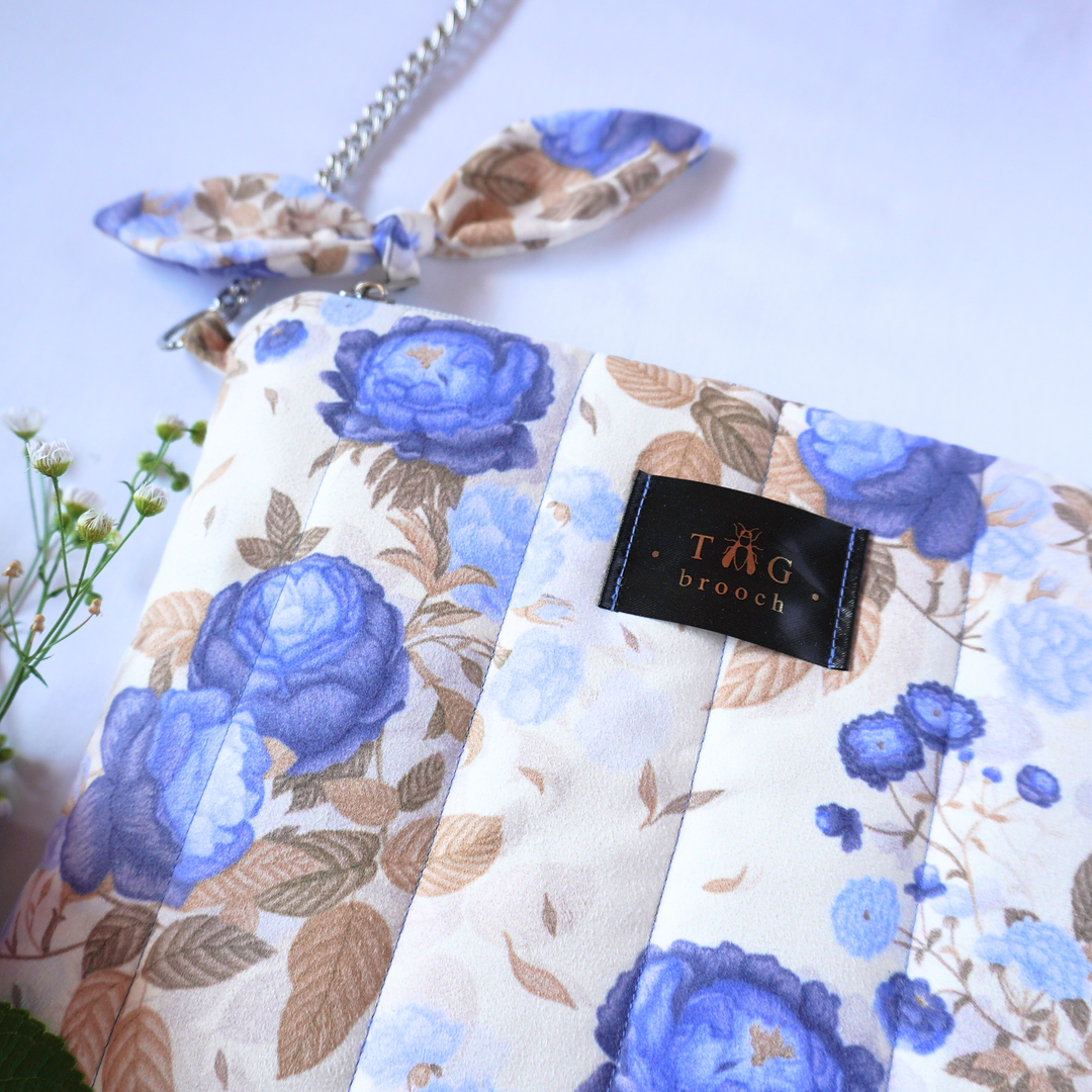 Handmade small quilted bag with blue roses pattern designed by TGbrooch