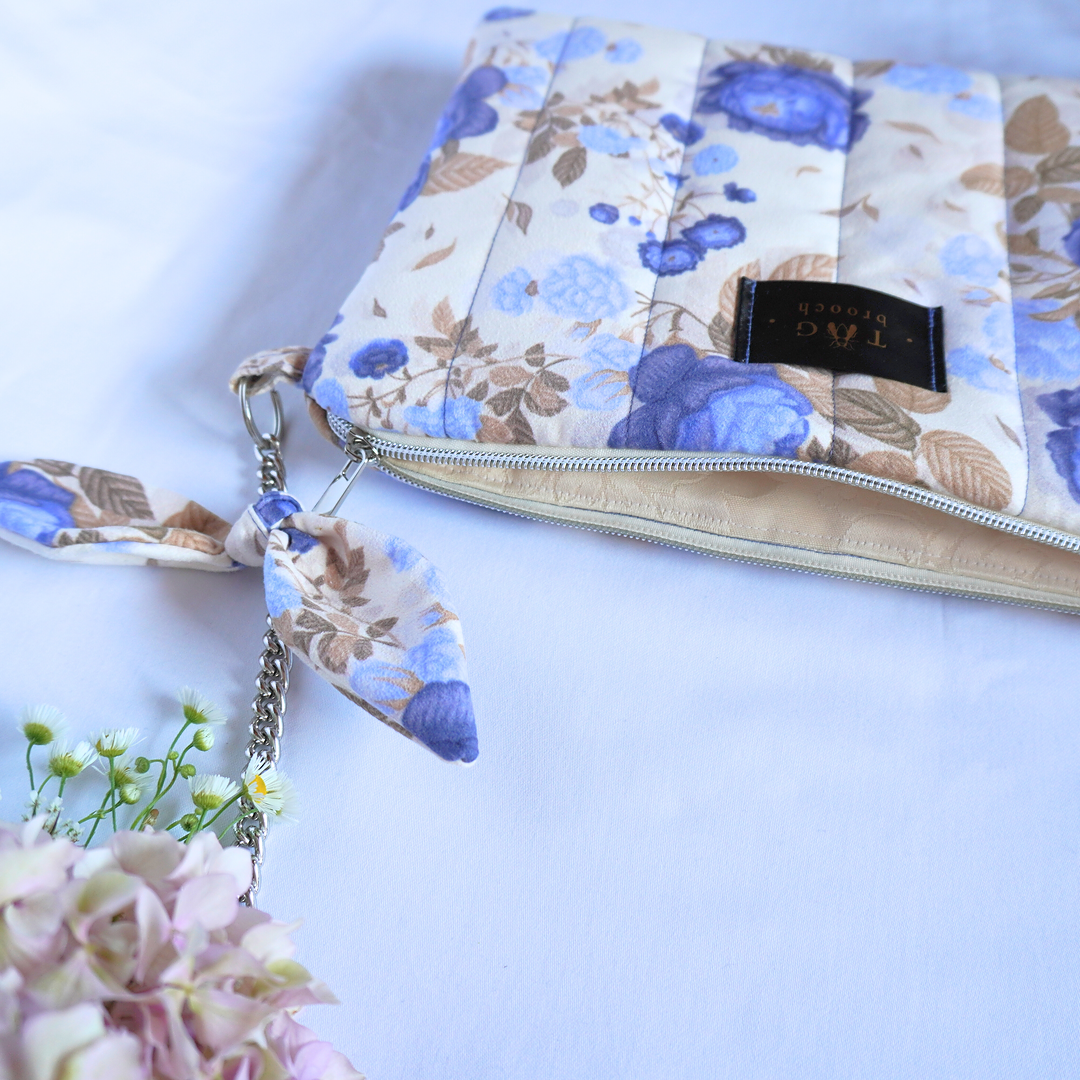 Detail of handmade small bag with floral pattern - TGbrooch