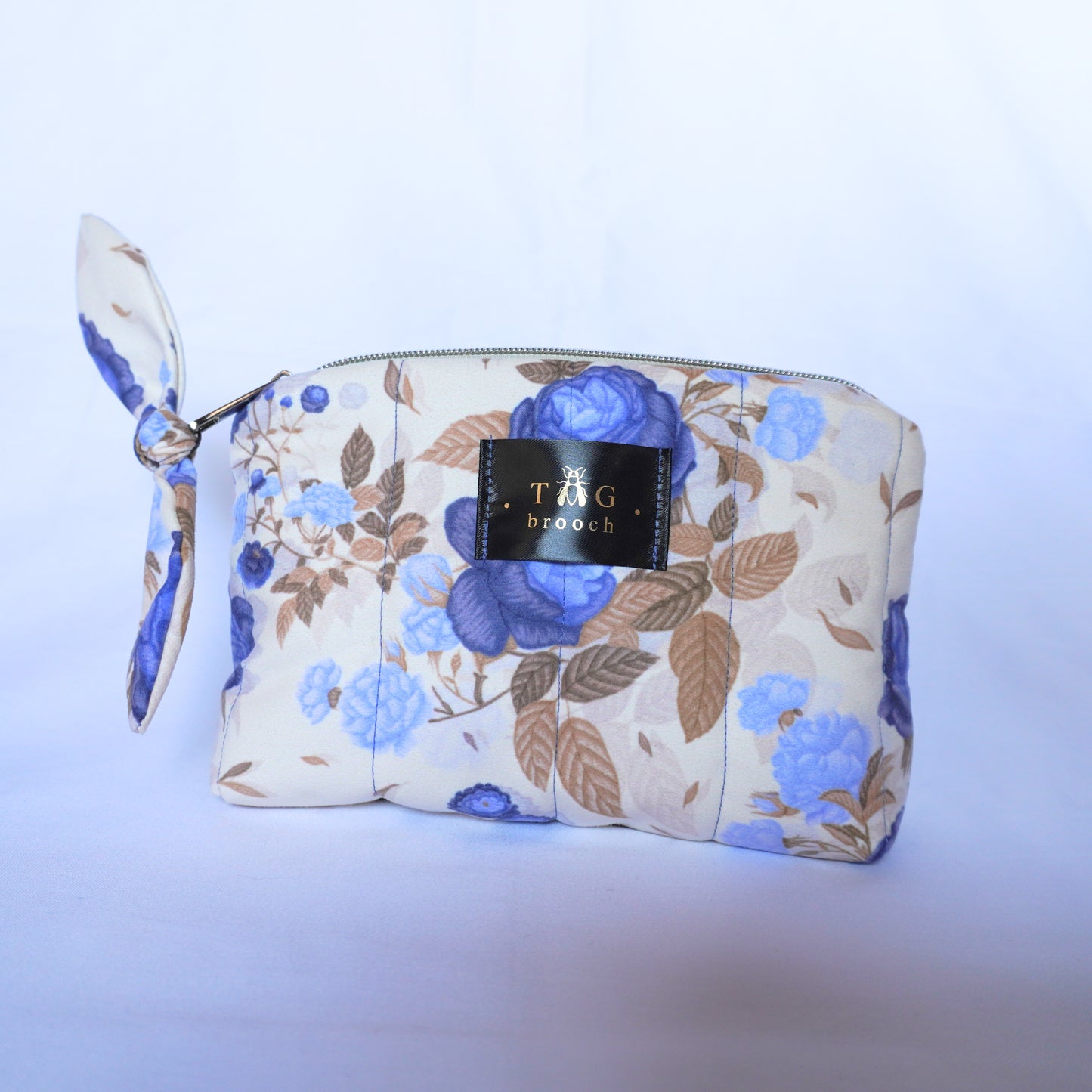 Handmade quilted toilerty bag with blue roses print - TGbrooch