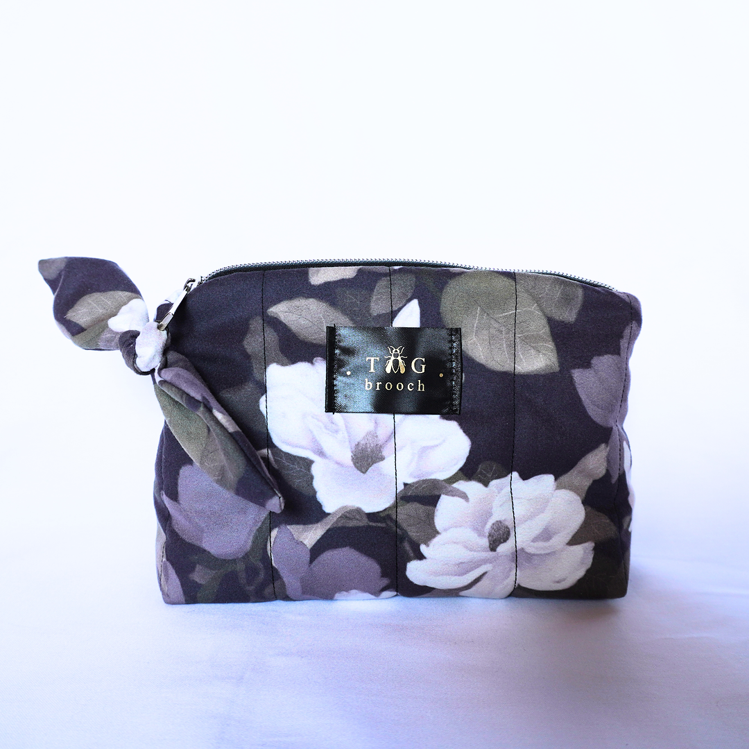 Small quilted toilerty bag with magnolia bloom pattern designed by TGbrooch