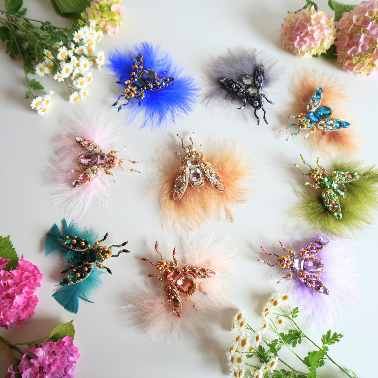 Handmade fly-shaped beaded brooch with crystals and metallic accents by TGbrooch