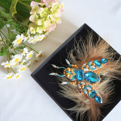 Handmade embroidered azure blue and gold insect brooch with feathers - TGbrooch