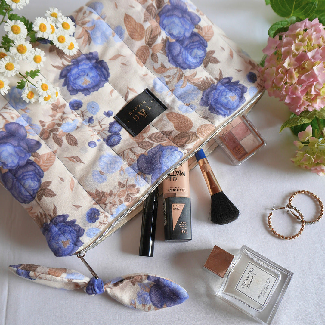 Floral makeup bag with blue roses floral pattern inspired by botany and handmade by TGbrooch