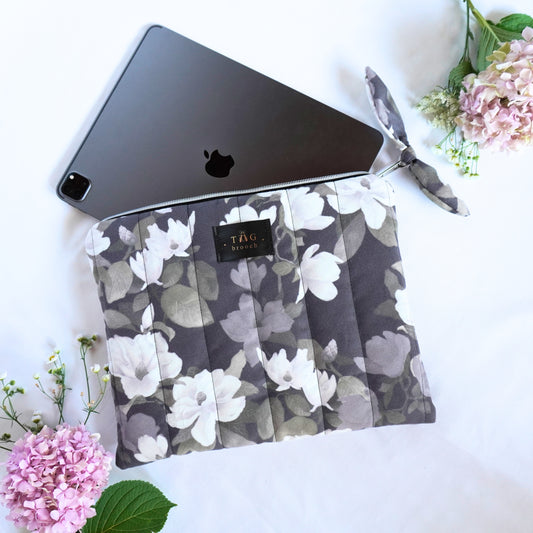 Floral-patterned Ipad pouch with magnolia bloom pattern designed by TGbrooch