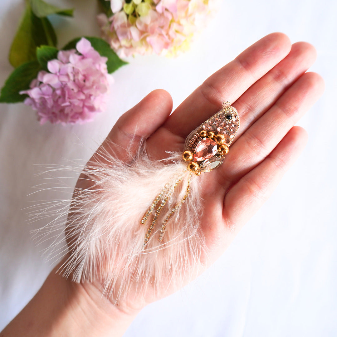 Handmade beaded bird TGbrooch small size with peach and gold gemstones, beads and feathers