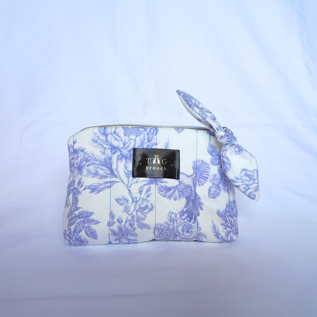 Handmade small quilted toiletry bag with elegant floral pattern - TGbrooch